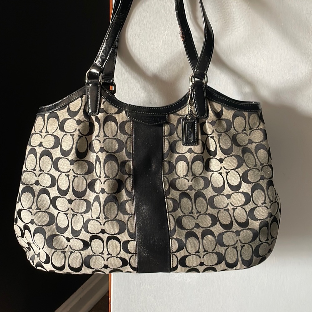 Black and gray coach purse